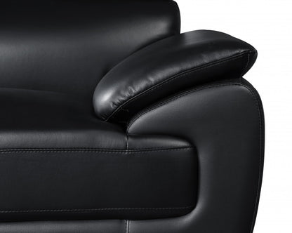 The Ironvale – Black Faux Leather Loveseat with Silver Legs