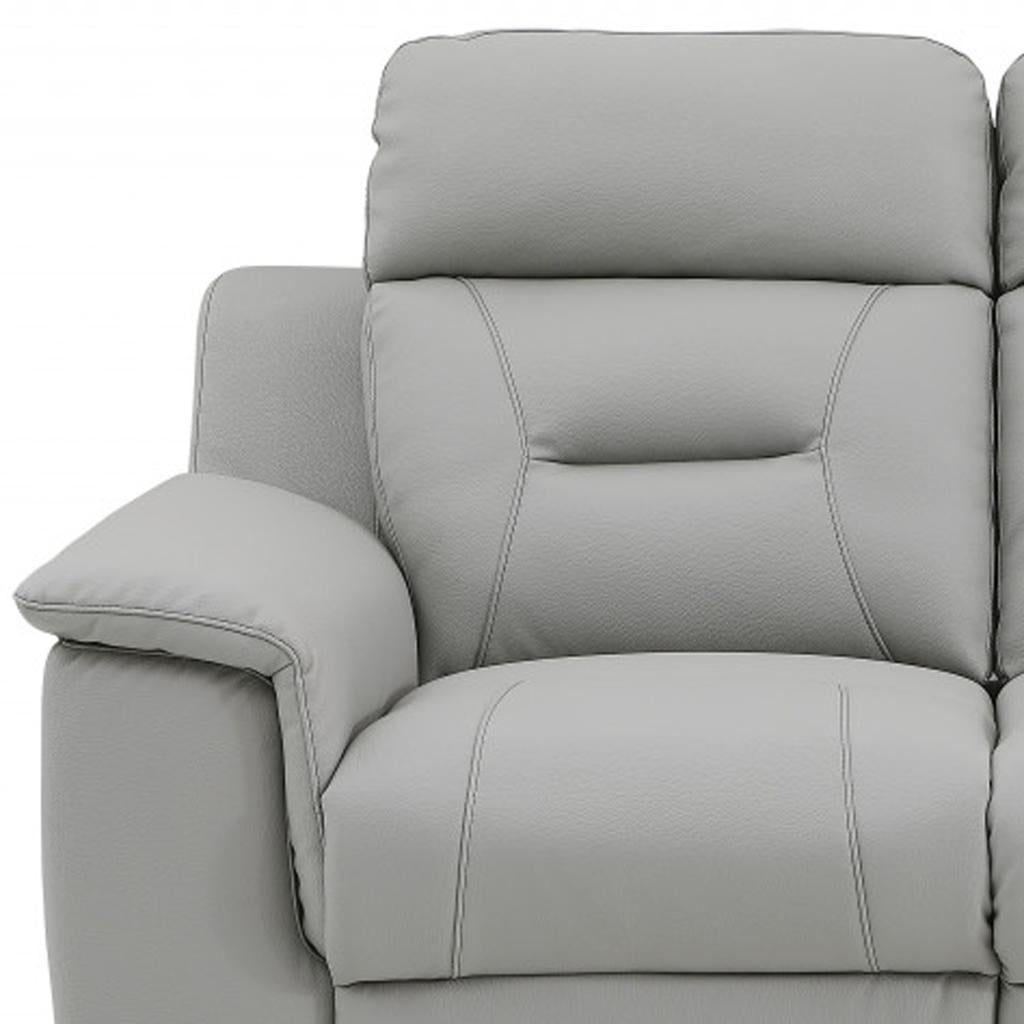 The Graysol – Gray & Brown Faux Leather Manual Reclining Loveseat