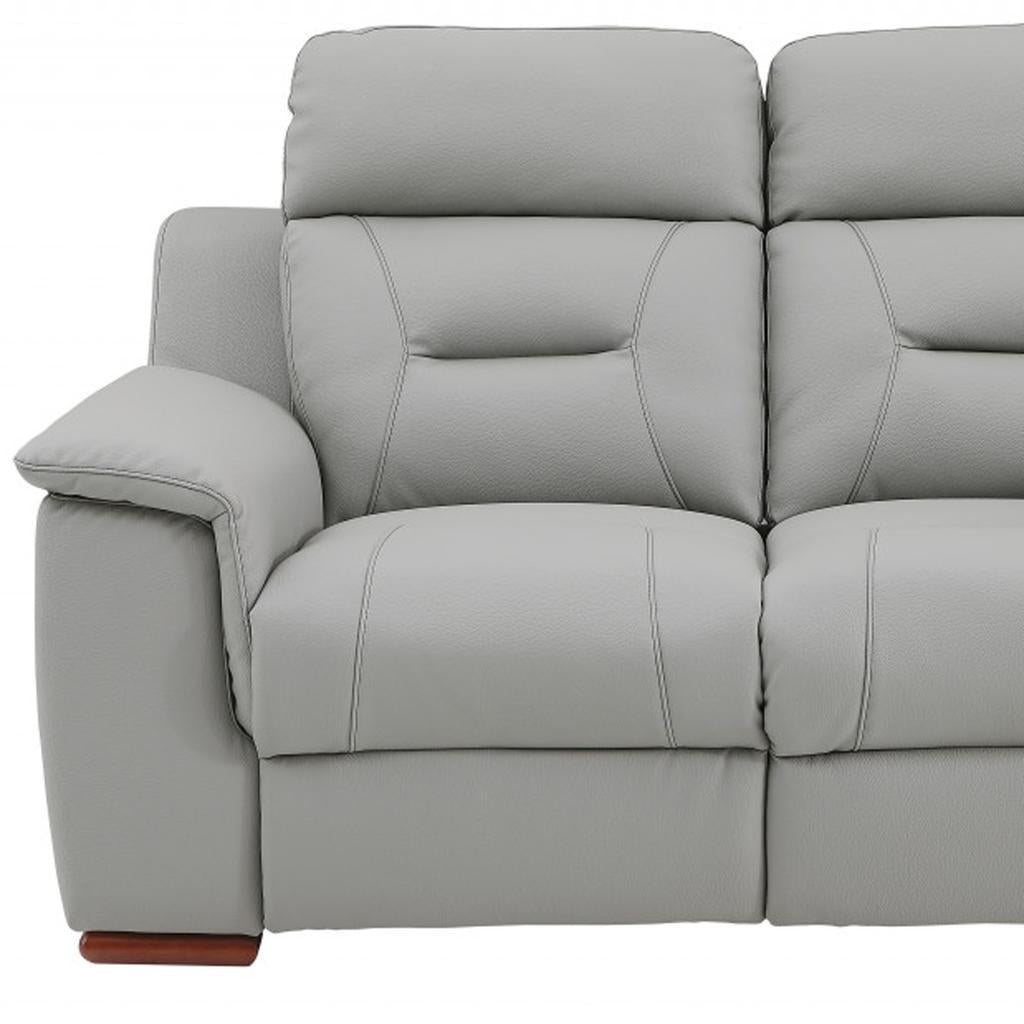 The Graysol – Gray & Brown Faux Leather Manual Reclining Loveseat