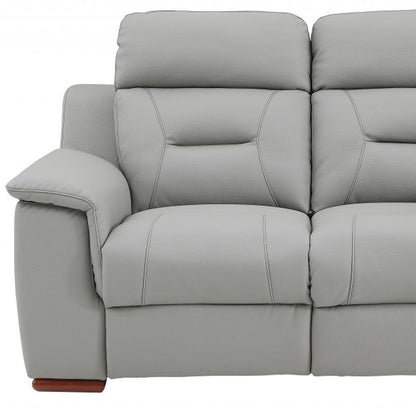 The Graysol – Gray & Brown Faux Leather Manual Reclining Loveseat