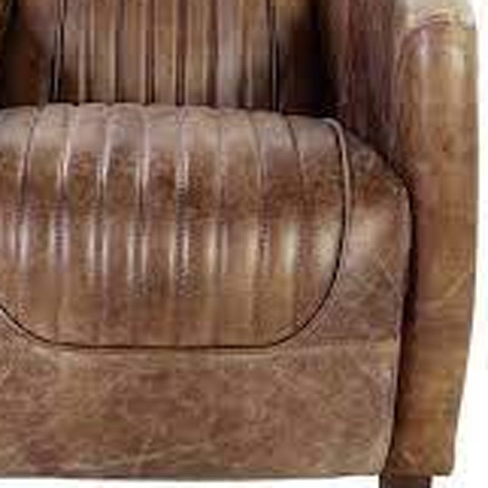 The Saluda – Brown Faux Leather Distressed Barrel Chair