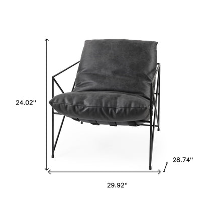 The Cal – Black Faux Leather Distressed Wingback Chair
