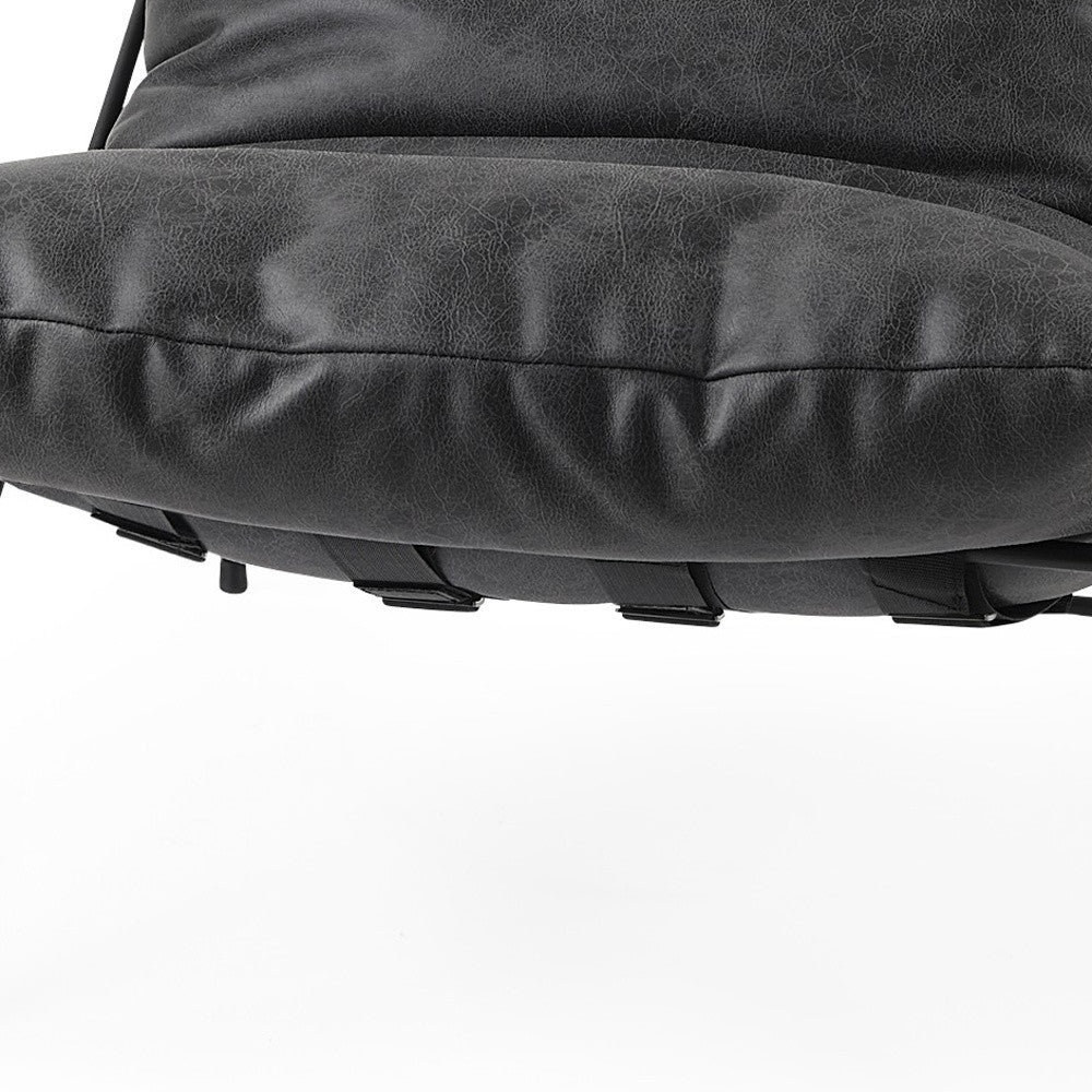 The Cal – Black Faux Leather Distressed Wingback Chair