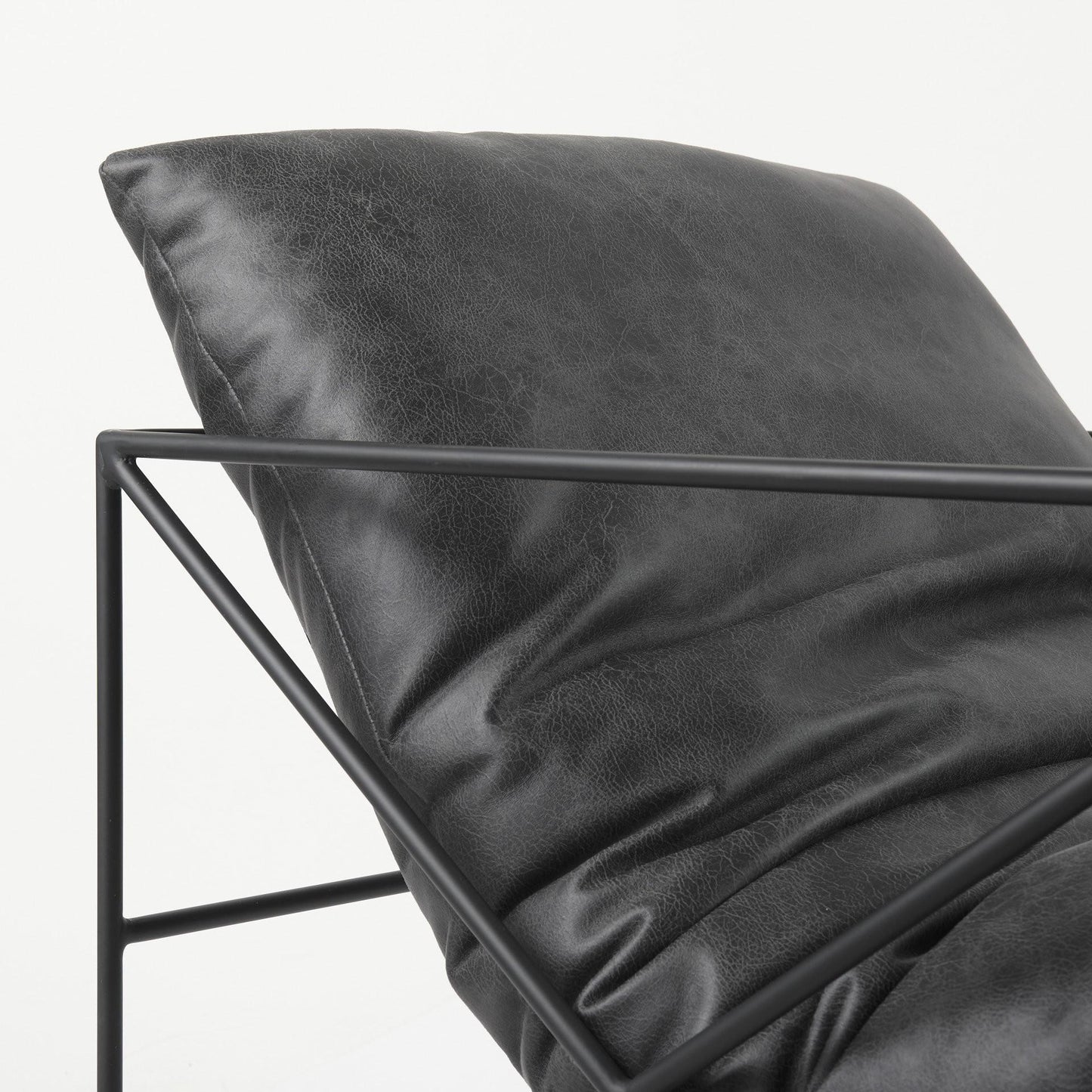 The Cal – Black Faux Leather Distressed Wingback Chair