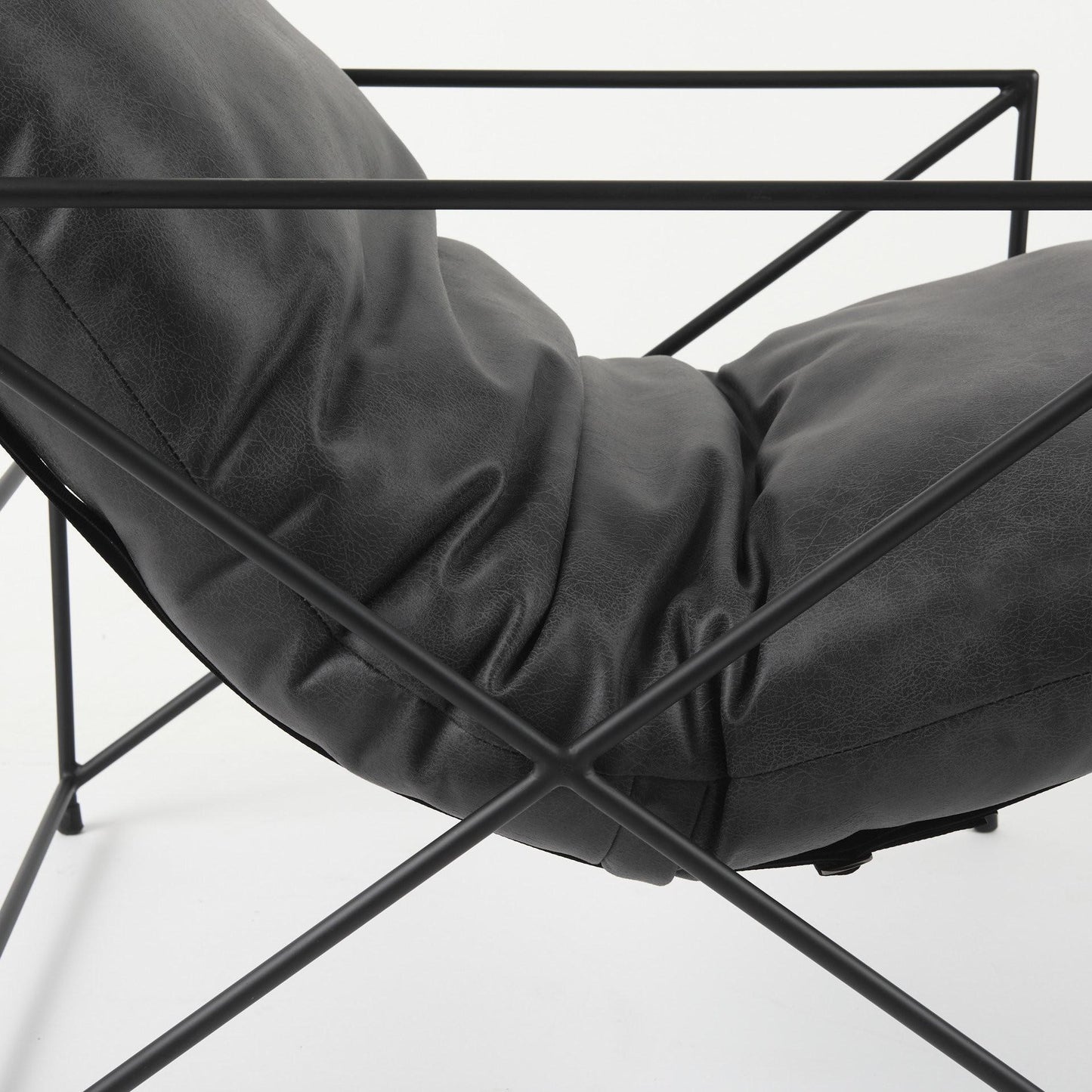 The Cal – Black Faux Leather Distressed Wingback Chair