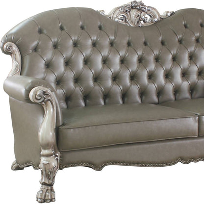 The Oryndal – 96" Bone Faux Leather Sofa with Toss Pillows & White Legs