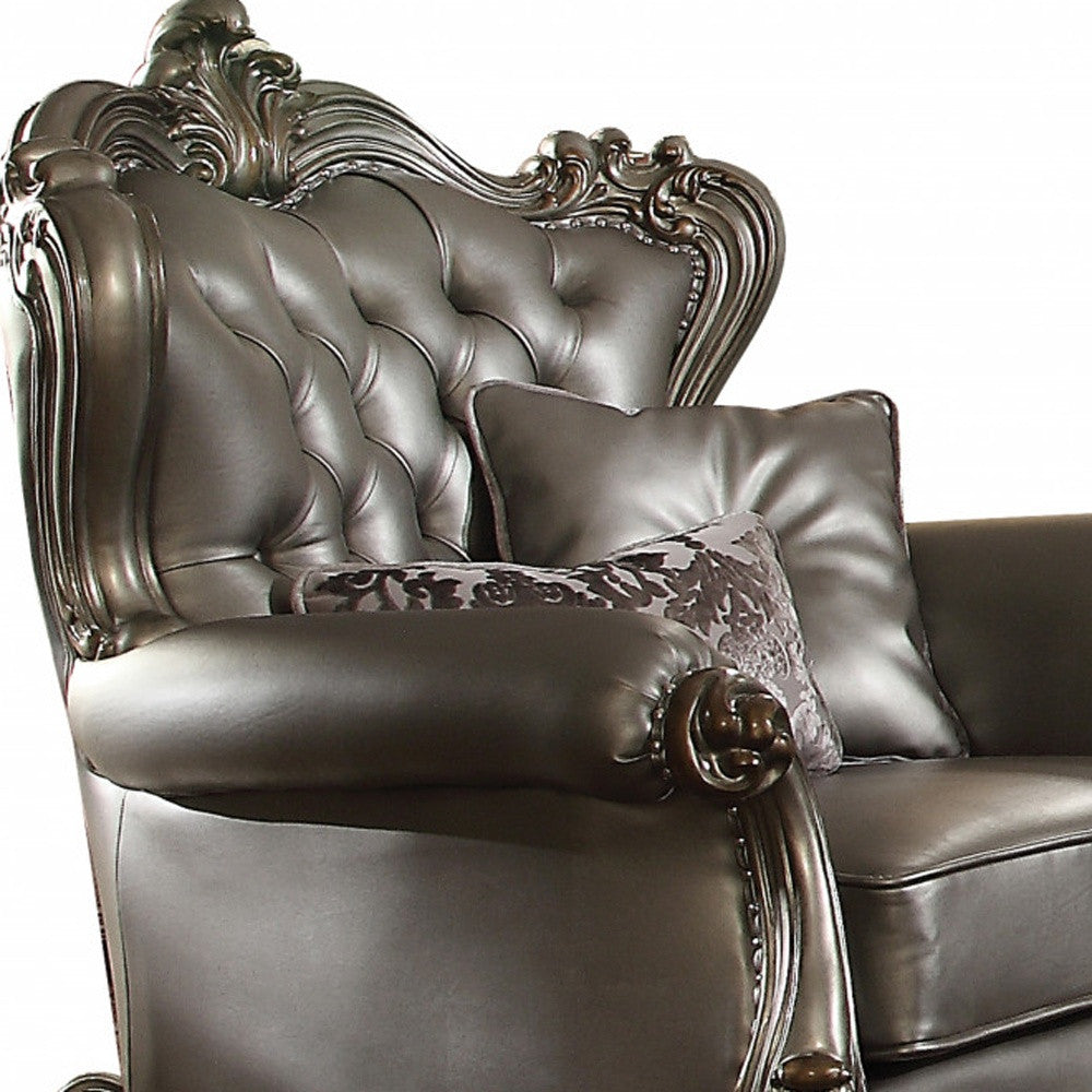 The Velmora – Silver & Platinum Faux Leather Tufted Wingback Chair with Toss Pillows